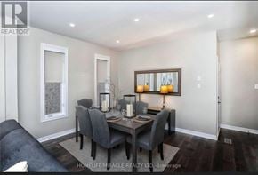 Brampton (Bram West) apartment for rent - A dining room with a table set for two and a couch.