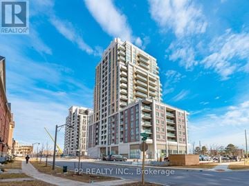 Markham (Wismer) condo for rent - A tall residential building with a clear blue sky in the background.