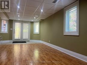 Vaughan (Sonoma Heights) apartment for rent - A room with wooden floors and a window with white blinds.