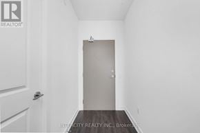 Brampton (Bram East) condo for rent - A white door is in a white room.