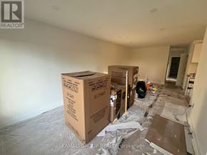 Newmarket (Bristol-London) apartment for rent - A room with boxes on the floor and walls covered in plastic.