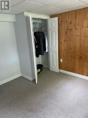 King (King City) apartment for rent - A room with a white door and a grey wall.