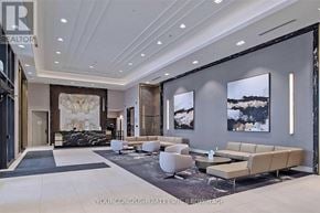 Markham (Unionville) condo for rent - A spacious living room with a large marble table and a long sofa.