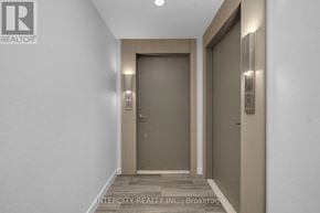 Brampton (Bram East) condo for rent - A hallway with two doors and a brokerage logo.