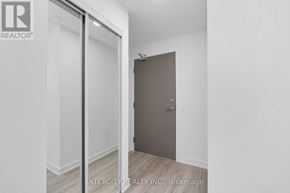 Brampton (Bram East) condo for rent - A room with a brown door and a white wall.