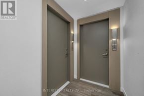 Brampton (Bram East) condo for rent - Two doors with Intercity Realty Inc. logo on them.