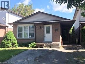 Hamilton apartment for rent - A house with a white door and a small porch.