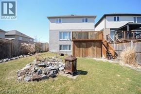 Breslau apartment for rent - A realtor photo of a house with a backyard.