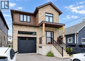 Kitchener apartment for rent - A modern house with a garage is for sale.