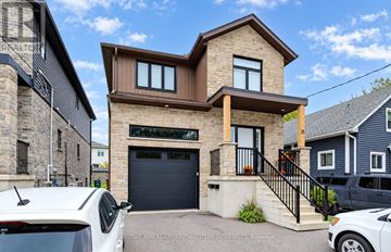 Kitchener apartment for rent - A modern house with a garage is for sale.