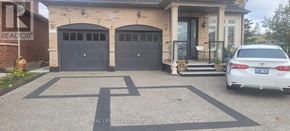 Milton (Sc Scott) apartment for rent - A white car is parked in a driveway in front of a house.