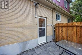Ottawa apartment for rent - A house with a red roof and a white door.