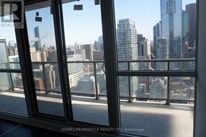 Toronto (Waterfront Communities) condo for rent - A view of a cityscape from a high-rise building.