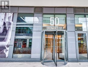 Toronto (Niagara) condo for rent - The entrance to a building with a glass door and a sign that reads "50 Ordnance St."