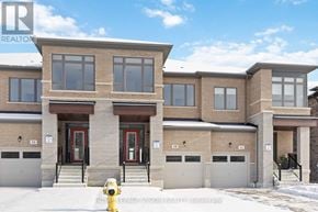 Whitby (Rolling Acres) townhouse for rent - A row of houses with a fire hydrant in front of them.