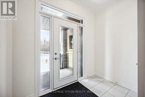Whitby (Rolling Acres) townhouse for rent - A white door with a glass window is open.