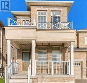 Milton (Fo Ford) apartment for rent - A two-story house with a balcony and a garage.
