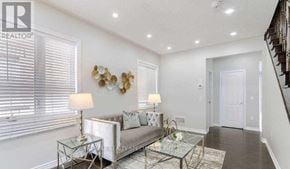 Milton (Fo Ford) apartment for rent - A living room with a glass table and a couch.