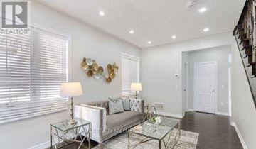Milton (Fo Ford) apartment for rent - A living room with a glass table and a couch.