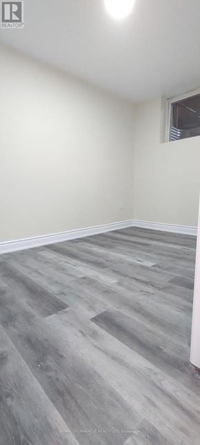 Mississauga (Meadowvale) apartment for rent - A room with a grey floor and white walls.