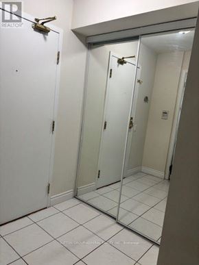 Vaughan (Crestwood-Springfarm-Yorkhill) condo for rent - A white door with a mirror on the right side.