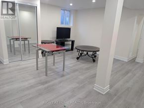 Ajax (Central West) apartment for rent - A room with a table and chairs in it.