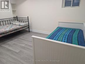 Ajax (Central West) apartment for rent - A bedroom with a bed and a bunk bed.