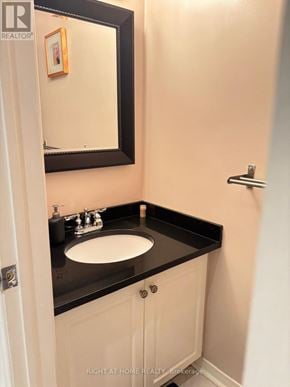 Mississauga (Lisgar) apartment for rent - A small bathroom with a sink and a mirror.