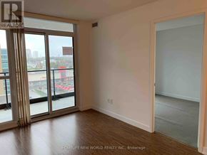 Toronto (Bayview Village) condo for rent - A room with a sliding glass door leading to a balcony.
