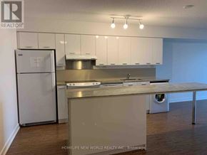 Toronto (Bayview Village) condo for rent - A kitchen with a refrigerator, stove, and countertop.