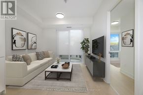 Toronto (Annex) condo for rent - A living room with a white couch, a coffee table, and a flat screen TV.