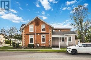 Oshawa (Central) apartment for rent - A house with a white car parked in front of it.