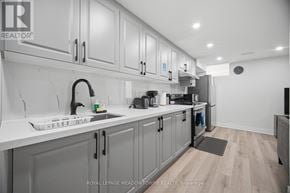 Mississauga (Meadowvale Village) apartment for rent - A kitchen with white cabinets and a sink.