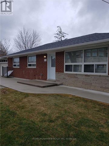 Vaughan (Maple) apartment for rent - A brick house with a white door and windows.