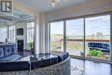 Vaughan (Kleinburg) apartment for rent - A living room with a couch and a television.