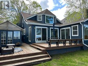 Brock (Beaverton) apartment for rent - A house with a deck and a balcony.