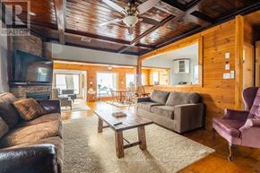 Brock (Beaverton) apartment for rent - A living room with a brown leather couch and a wooden coffee table.