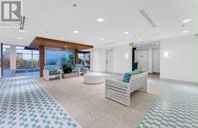 Toronto (Mimico) condo for rent - A real estate office with a white and blue tiled floor.