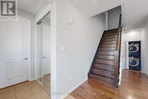 Pickering (Duffin Heights) apartment for rent - A room with a staircase leading to the upper floor.