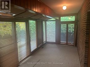 Markham (Box Grove) apartment for rent - A room with a carpet floor and a window with blinds.