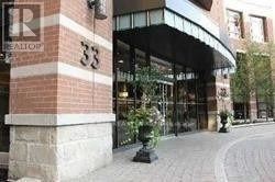 Toronto (Willowdale East) condo for rent - A building with the number 33 on it.
