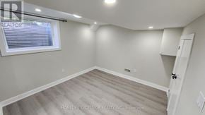 Markham (Greensborough) apartment for rent - A room with a window and a wooden floor.