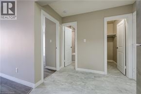 Cambridge apartment for rent - A room with three open doors and a carpeted floor.