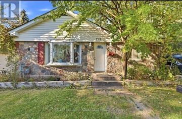 Pickering (Rougemount) apartment for rent - A house with the number 158 on the front door.