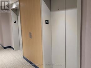 Mississauga (City Centre) condo for rent - A hallway with a door numbered 47.