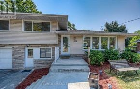 Kitchener duplex for rent - A house with the number 209 on the front door.
