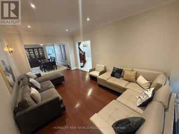 Richmond Hill (South Richvale) apartment for rent - A living room with a grey couch and a white couch.