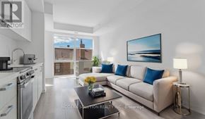 Toronto (Weston-Pellam Park) condo for rent - A modern living room with a large painting on the wall and a view of a building outside the window.