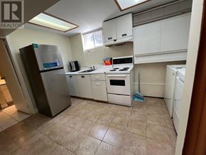 Mississauga (Erindale) apartment for rent - A kitchen with a refrigerator, oven, and dishwasher.
