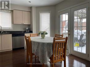Barrie (Ardagh) apartment for rent - A dining room with a table set for four.